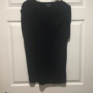 V-neck black tee with rolled sleeves